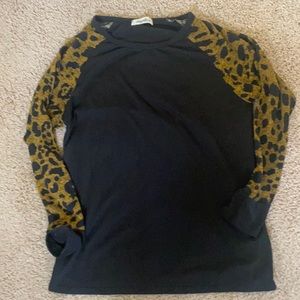 Black tunic with leopard print sleeved